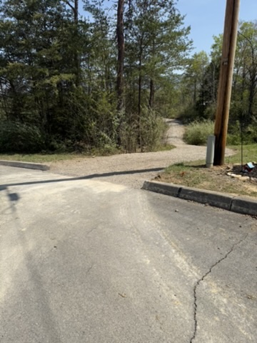 Repaired gravel driveway and access area