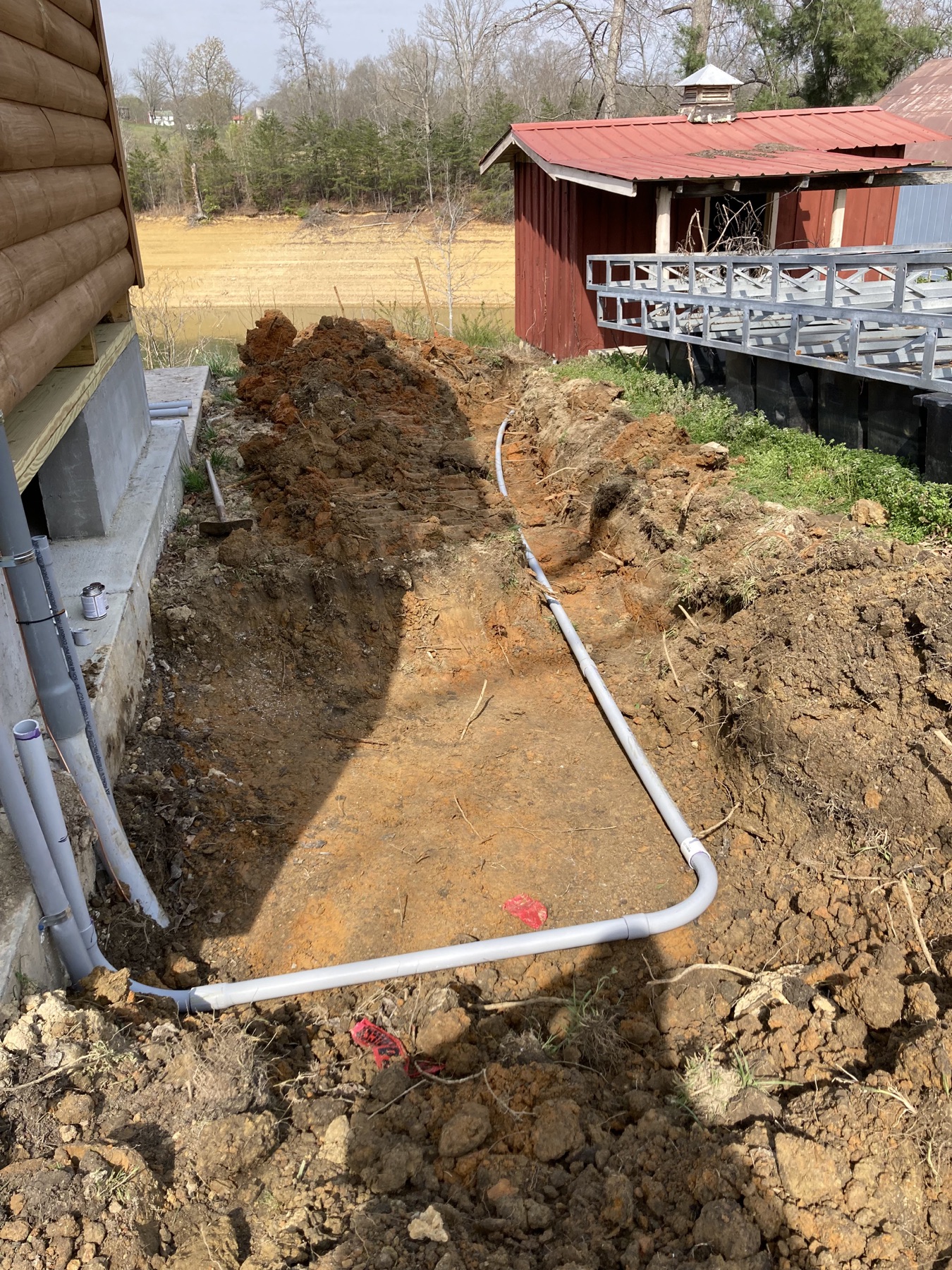 Underground utility line installed beside an East Tennessee home